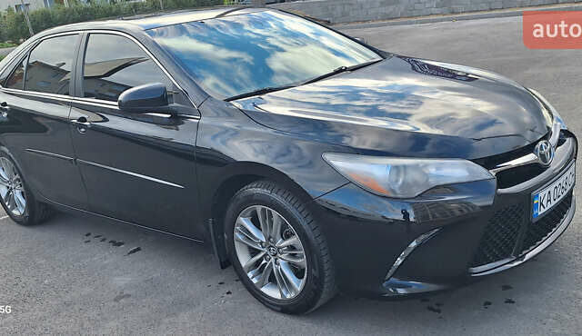 Черный Тойота Камри, объемом двигателя 2.49 л и пробегом 128 тыс. км за 16500 $, фото 1 на Automoto.ua