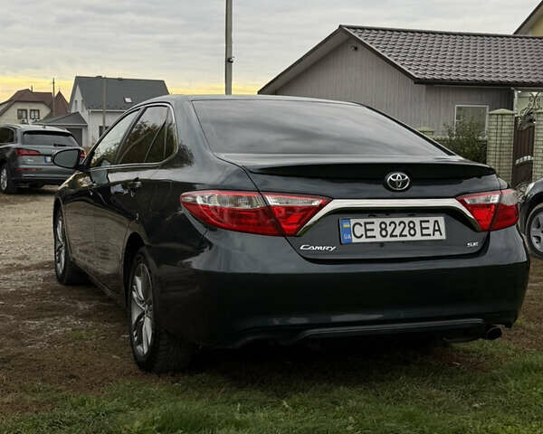 Чорний Тойота Камрі, об'ємом двигуна 2.49 л та пробігом 176 тис. км за 14500 $, фото 4 на Automoto.ua