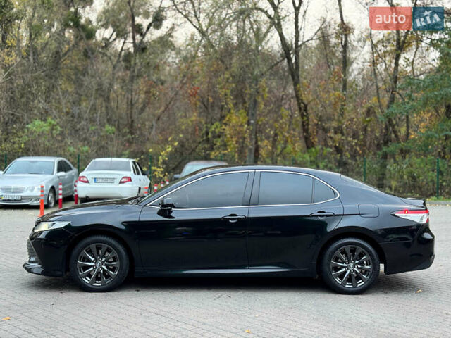 Черный Тойота Камри, объемом двигателя 2.5 л и пробегом 205 тыс. км за 22000 $, фото 6 на Automoto.ua