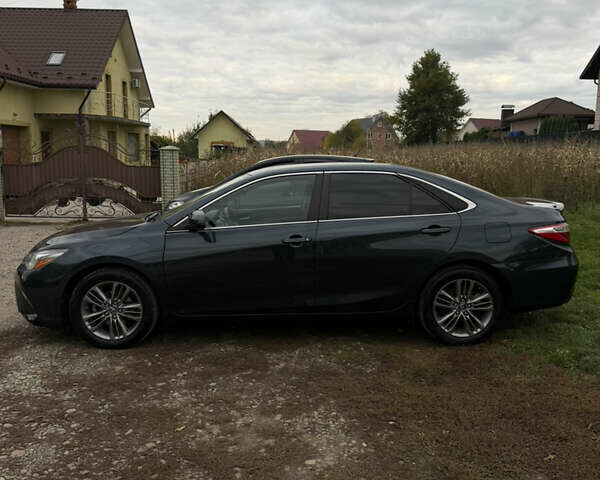 Чорний Тойота Камрі, об'ємом двигуна 2.49 л та пробігом 176 тис. км за 14500 $, фото 3 на Automoto.ua