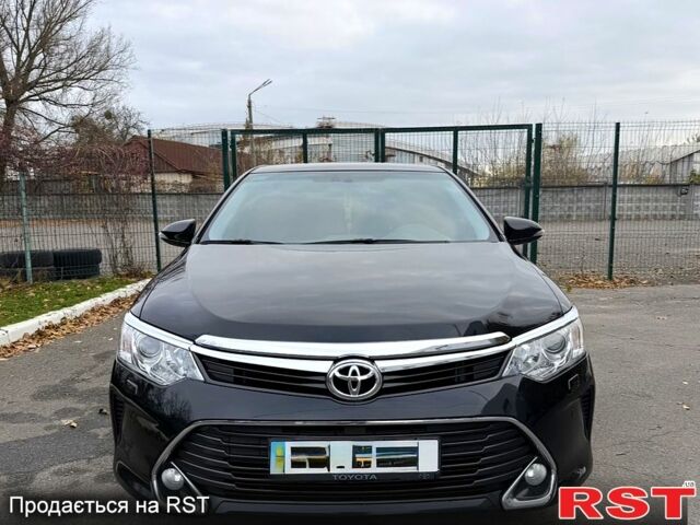 Чорний Тойота Камрі, об'ємом двигуна 2.5 л та пробігом 133 тис. км за 18200 $, фото 1 на Automoto.ua