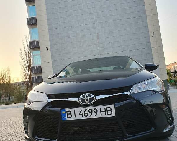 Чорний Тойота Камрі, об'ємом двигуна 2.49 л та пробігом 75 тис. км за 16800 $, фото 16 на Automoto.ua