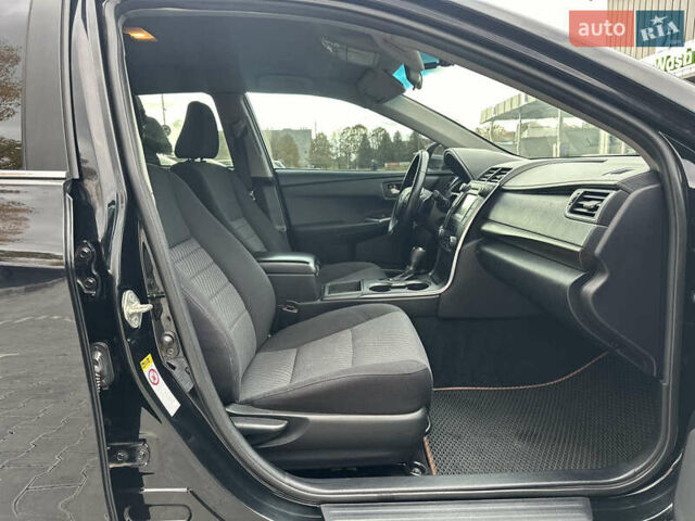 Чорний Тойота Камрі, об'ємом двигуна 2.49 л та пробігом 185 тис. км за 14500 $, фото 2 на Automoto.ua