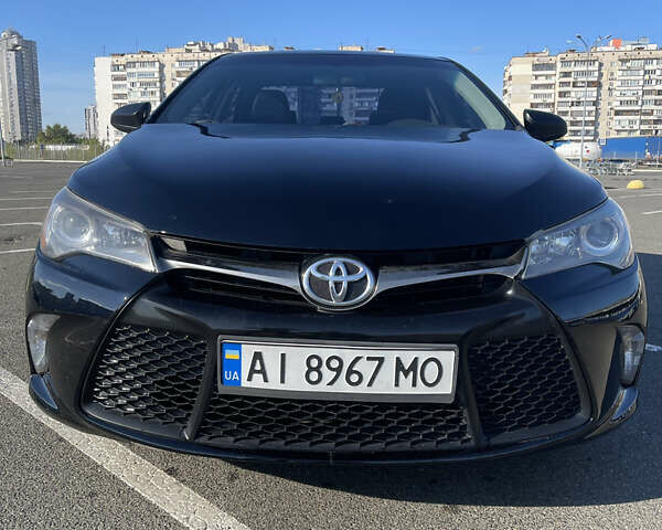 Черный Тойота Камри, объемом двигателя 2.4 л и пробегом 190 тыс. км за 10800 $, фото 1 на Automoto.ua