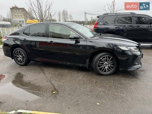 Чорний Тойота Камрі, об'ємом двигуна 2.49 л та пробігом 148 тис. км за 19800 $, фото 4 на Automoto.ua