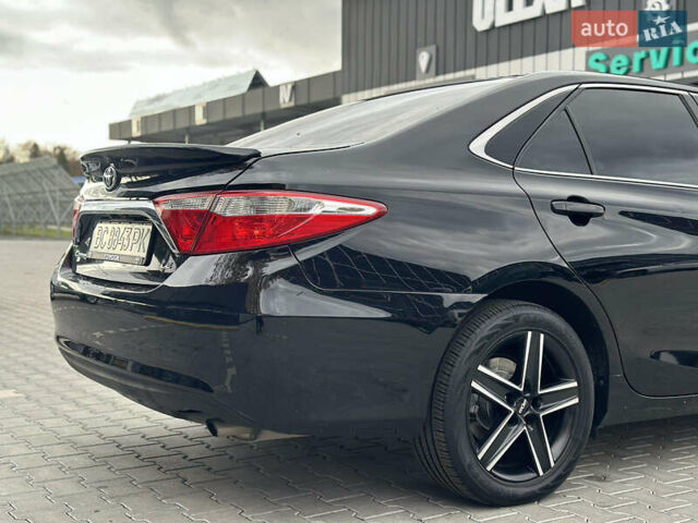 Чорний Тойота Камрі, об'ємом двигуна 2.49 л та пробігом 185 тис. км за 14500 $, фото 42 на Automoto.ua
