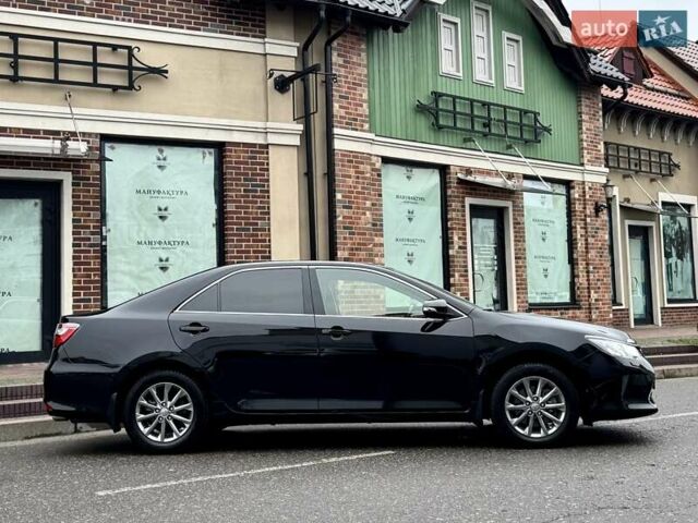 Черный Тойота Камри, объемом двигателя 2.49 л и пробегом 70 тыс. км за 20000 $, фото 7 на Automoto.ua