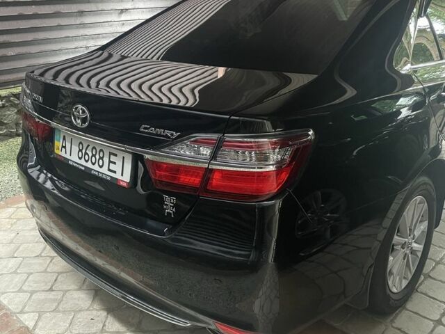 Черный Тойота Камри, объемом двигателя 2.5 л и пробегом 143 тыс. км за 17300 $, фото 3 на Automoto.ua