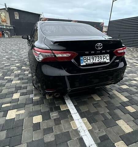 Черный Тойота Камри, объемом двигателя 2.5 л и пробегом 150 тыс. км за 22000 $, фото 1 на Automoto.ua