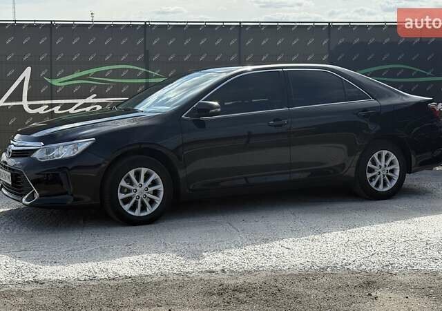 Черный Тойота Камри, объемом двигателя 2.49 л и пробегом 105 тыс. км за 17000 $, фото 1 на Automoto.ua