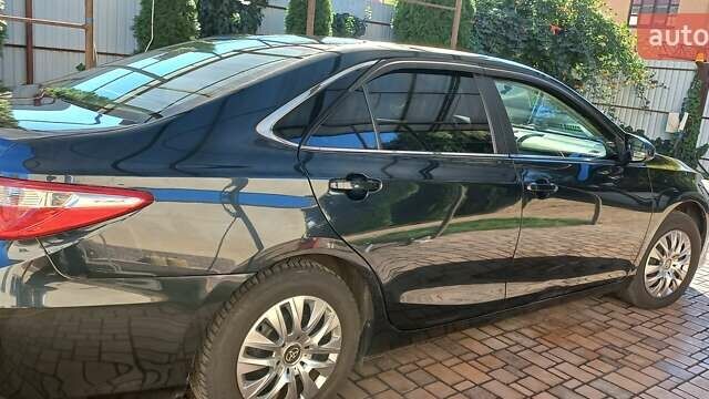 Чорний Тойота Камрі, об'ємом двигуна 2.49 л та пробігом 240 тис. км за 12000 $, фото 5 на Automoto.ua