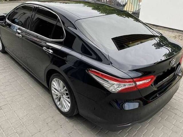 Черный Тойота Камри, объемом двигателя 2.5 л и пробегом 85 тыс. км за 16400 $, фото 2 на Automoto.ua