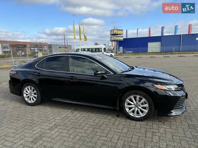 Черный Тойота Камри, объемом двигателя 2.5 л и пробегом 167 тыс. км за 18000 $, фото 6 на Automoto.ua