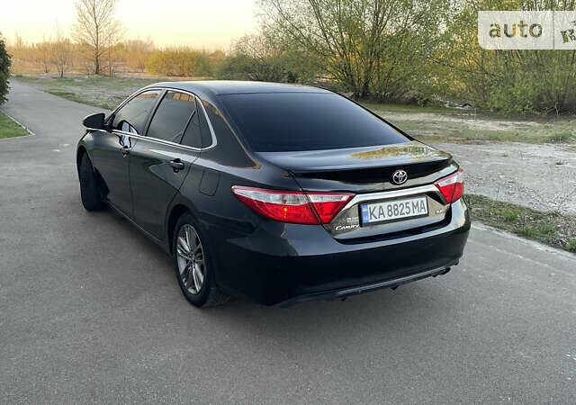 Черный Тойота Камри, объемом двигателя 2.49 л и пробегом 150 тыс. км за 14499 $, фото 1 на Automoto.ua