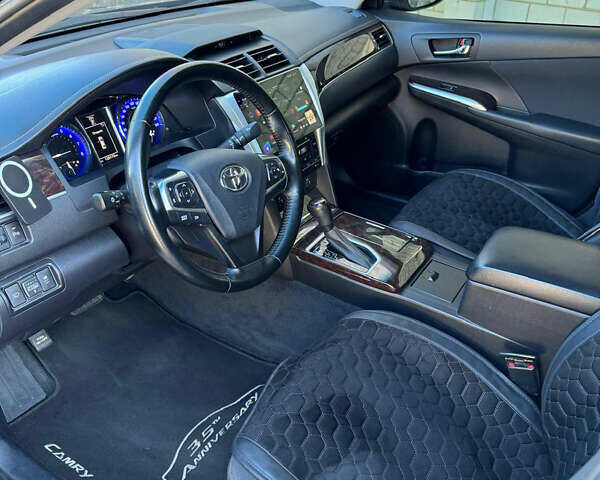 Черный Тойота Камри, объемом двигателя 2.49 л и пробегом 143 тыс. км за 17300 $, фото 3 на Automoto.ua