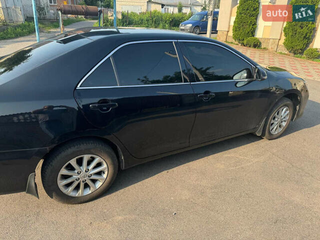 Чорний Тойота Камрі, об'ємом двигуна 2.49 л та пробігом 142 тис. км за 17100 $, фото 11 на Automoto.ua