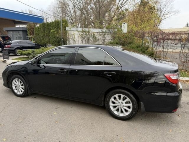 Черный Тойота Камри, объемом двигателя 2.5 л и пробегом 133 тыс. км за 18700 $, фото 7 на Automoto.ua
