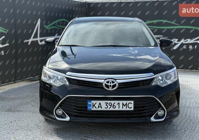 Черный Тойота Камри, объемом двигателя 2.49 л и пробегом 105 тыс. км за 17000 $, фото 2 на Automoto.ua