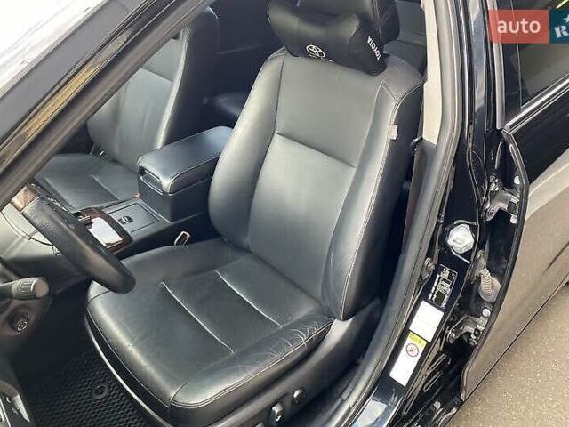 Чорний Тойота Камрі, об'ємом двигуна 2.49 л та пробігом 135 тис. км за 16400 $, фото 4 на Automoto.ua
