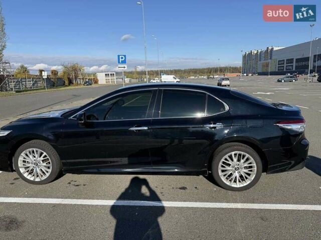 Черный Тойота Камри, объемом двигателя 2.5 л и пробегом 127 тыс. км за 22500 $, фото 1 на Automoto.ua