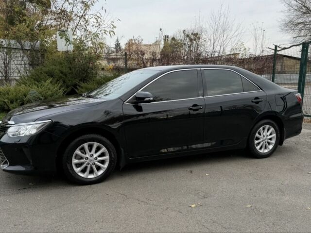 Черный Тойота Камри, объемом двигателя 2.5 л и пробегом 133 тыс. км за 18700 $, фото 1 на Automoto.ua