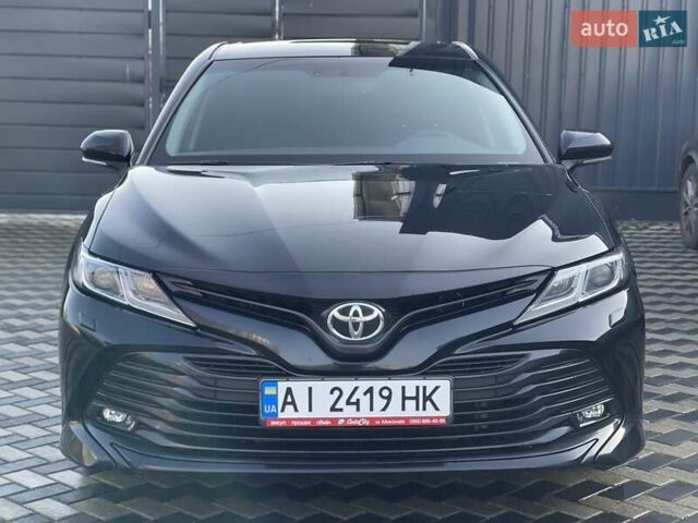 Черный Тойота Камри, объемом двигателя 2.49 л и пробегом 148 тыс. км за 19800 $, фото 1 на Automoto.ua