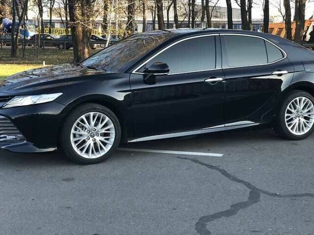 Черный Тойота Камри, объемом двигателя 2.5 л и пробегом 71 тыс. км за 15000 $, фото 1 на Automoto.ua