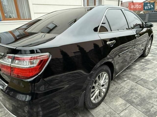 Черный Тойота Камри, объемом двигателя 2.49 л и пробегом 210 тыс. км за 16950 $, фото 21 на Automoto.ua