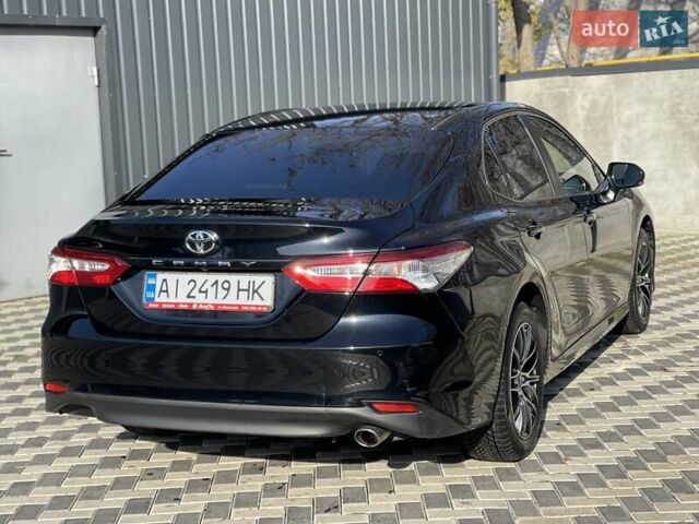 Черный Тойота Камри, объемом двигателя 2.49 л и пробегом 148 тыс. км за 19800 $, фото 15 на Automoto.ua