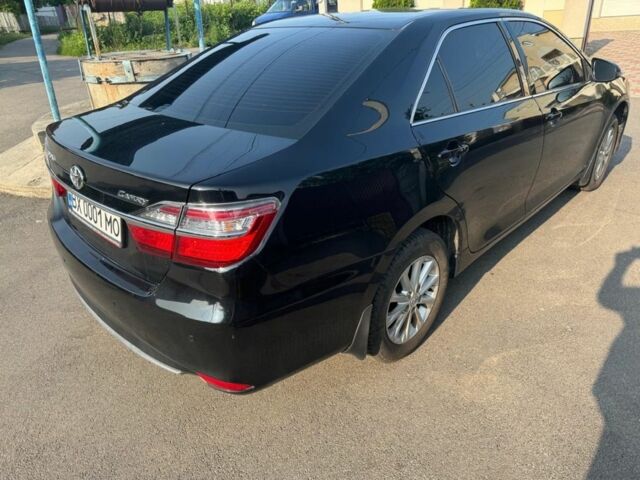 Чорний Тойота Камрі, об'ємом двигуна 2.5 л та пробігом 140 тис. км за 16500 $, фото 2 на Automoto.ua