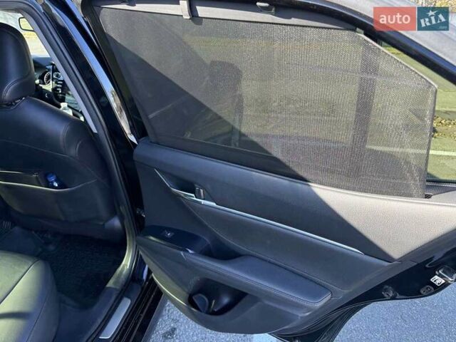 Черный Тойота Камри, объемом двигателя 2.5 л и пробегом 127 тыс. км за 22500 $, фото 4 на Automoto.ua