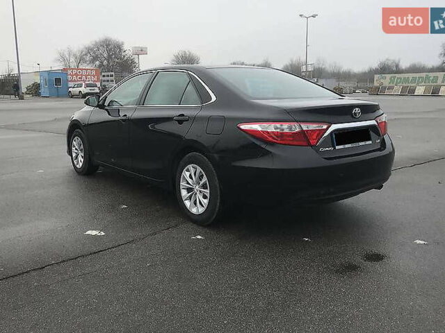 Черный Тойота Камри, объемом двигателя 2.5 л и пробегом 130 тыс. км за 15200 $, фото 5 на Automoto.ua