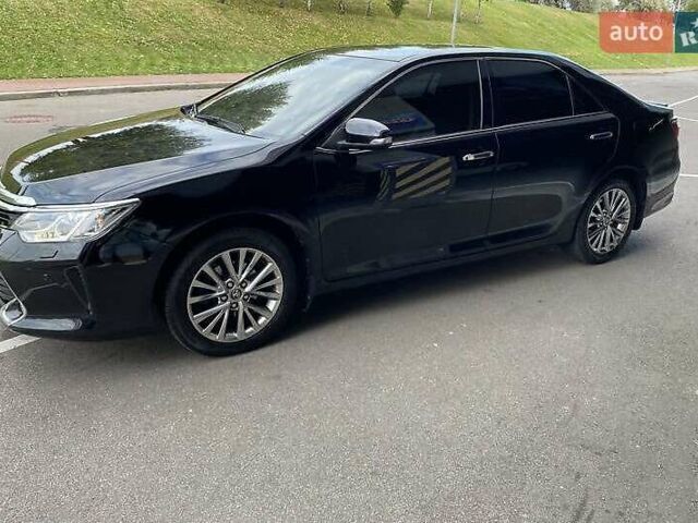 Чорний Тойота Камрі, об'ємом двигуна 2.49 л та пробігом 135 тис. км за 16400 $, фото 1 на Automoto.ua