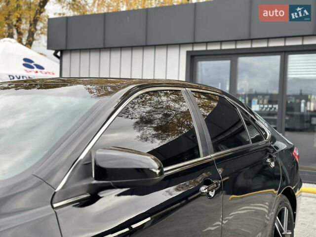 Чорний Тойота Камрі, об'ємом двигуна 2.49 л та пробігом 185 тис. км за 14500 $, фото 19 на Automoto.ua