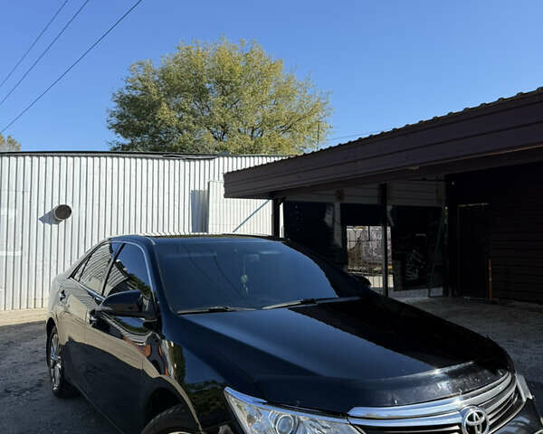 Чорний Тойота Камрі, об'ємом двигуна 2.49 л та пробігом 207 тис. км за 17500 $, фото 1 на Automoto.ua