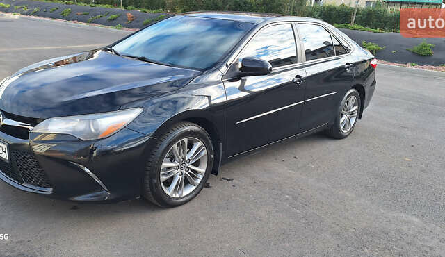 Черный Тойота Камри, объемом двигателя 2.49 л и пробегом 128 тыс. км за 16500 $, фото 4 на Automoto.ua