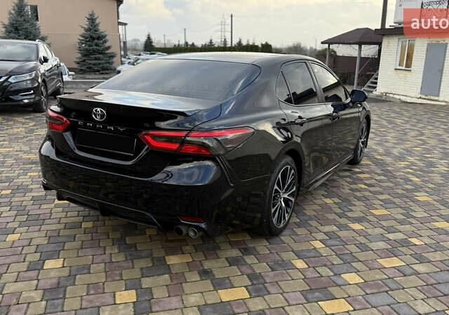Черный Тойота Камри, объемом двигателя 2.49 л и пробегом 155 тыс. км за 18999 $, фото 5 на Automoto.ua