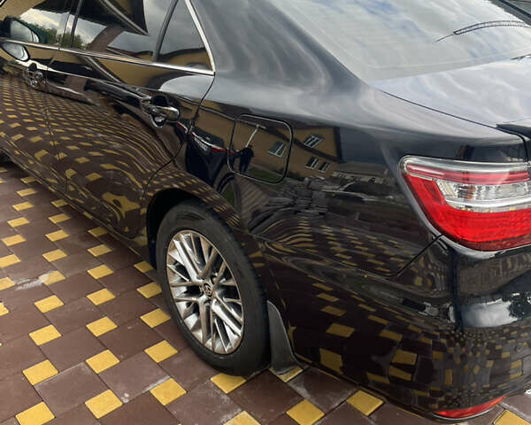 Черный Тойота Камри, объемом двигателя 2.5 л и пробегом 212 тыс. км за 16500 $, фото 2 на Automoto.ua