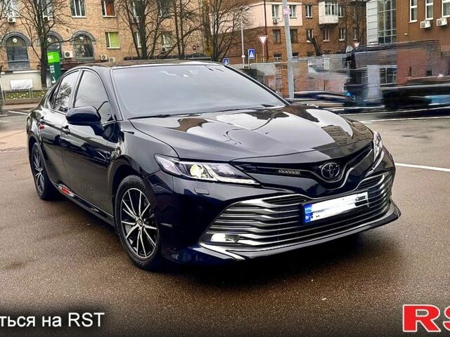 Черный Тойота Камри, объемом двигателя 2.5 л и пробегом 77 тыс. км за 25600 $, фото 1 на Automoto.ua