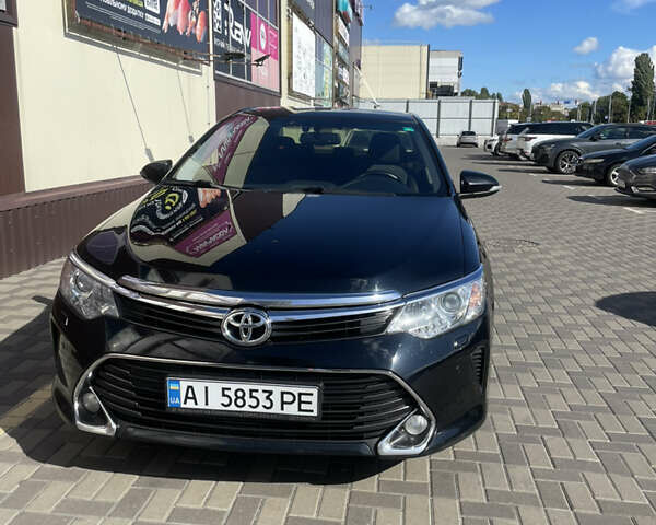 Черный Тойота Камри, объемом двигателя 2.49 л и пробегом 202 тыс. км за 16499 $, фото 1 на Automoto.ua