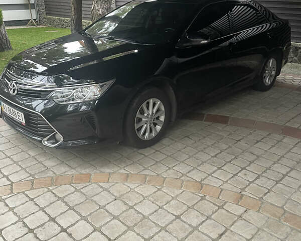 Черный Тойота Камри, объемом двигателя 2.49 л и пробегом 143 тыс. км за 17300 $, фото 1 на Automoto.ua