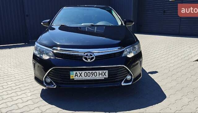 Черный Тойота Камри, объемом двигателя 2.49 л и пробегом 159 тыс. км за 19500 $, фото 1 на Automoto.ua