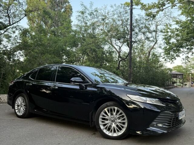 Черный Тойота Камри, объемом двигателя 2.5 л и пробегом 129 тыс. км за 25499 $, фото 1 на Automoto.ua