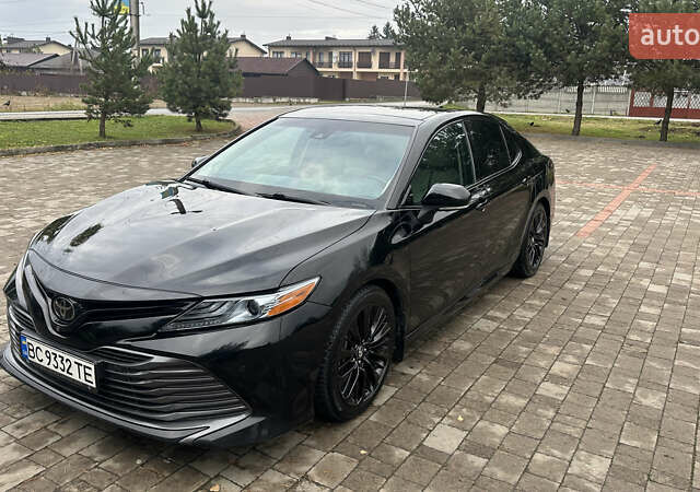 Черный Тойота Камри, объемом двигателя 2.49 л и пробегом 152 тыс. км за 20500 $, фото 1 на Automoto.ua