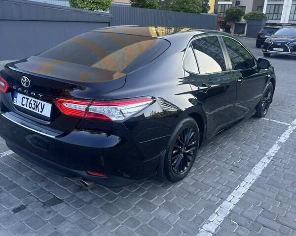 Черный Тойота Камри, объемом двигателя 2.5 л и пробегом 168 тыс. км за 20900 $, фото 3 на Automoto.ua