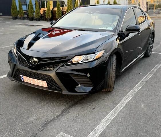 Черный Тойота Камри, объемом двигателя 2.5 л и пробегом 150 тыс. км за 19300 $, фото 1 на Automoto.ua