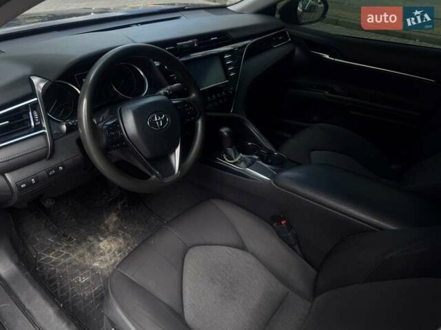 Черный Тойота Камри, объемом двигателя 2.49 л и пробегом 130 тыс. км за 21000 $, фото 1 на Automoto.ua