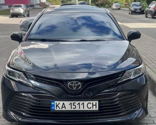 Черный Тойота Камри, объемом двигателя 2.49 л и пробегом 130 тыс. км за 21000 $, фото 4 на Automoto.ua