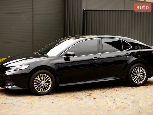 Черный Тойота Камри, объемом двигателя 2.49 л и пробегом 120 тыс. км за 23000 $, фото 1 на Automoto.ua