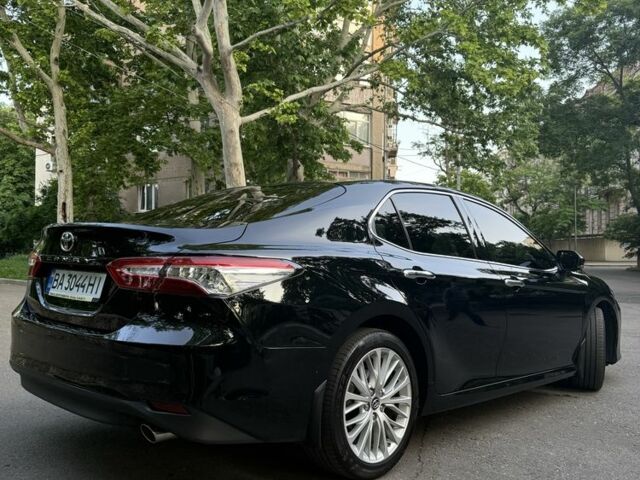 Черный Тойота Камри, объемом двигателя 2.5 л и пробегом 129 тыс. км за 25499 $, фото 3 на Automoto.ua